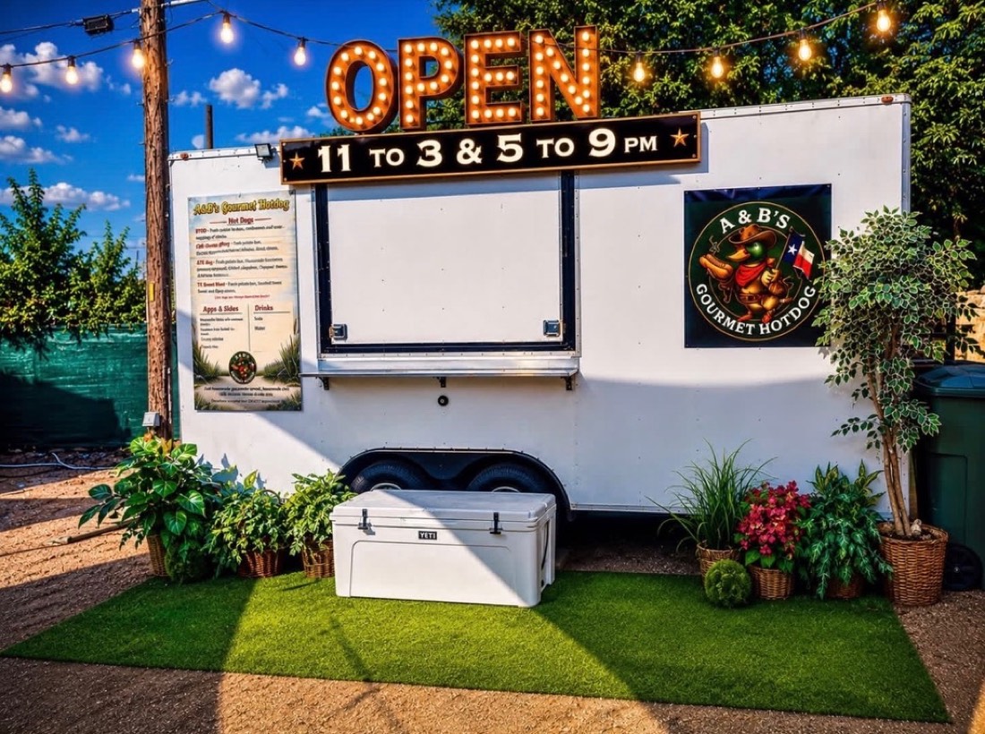 A&B's Gourmet Hotdog trailer with OPEN marquee